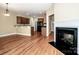 Open kitchen features a breakfast bar and hardwood floors at 131 Quail Haven Dr, Troutman, NC 28166