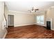 Hardwood floors, fireplace and large windows in living room at 131 Quail Haven Dr, Troutman, NC 28166