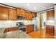 Modern kitchen with granite countertops and stainless steel appliances at 136 Kingston Dr, Mount Holly, NC 28120