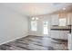 Dining area with hardwood floors and access to the backyard at 235 Long St, Statesville, NC 28677