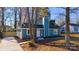 Newly renovated blue house with a landscaped yard and driveway at 2515 Dion Ave, Charlotte, NC 28212