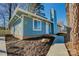 Newly renovated blue house with brick accents and walkway at 2515 Dion Ave, Charlotte, NC 28212