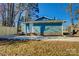 Newly renovated home with blue siding and a concrete patio at 2515 Dion Ave, Charlotte, NC 28212