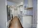 Modern kitchen with stainless steel appliances and granite counters at 2515 Dion Ave, Charlotte, NC 28212