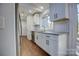 Renovated kitchen featuring stainless steel appliances and white cabinetry at 2515 Dion Ave, Charlotte, NC 28212