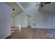 Bright living room featuring hardwood floors and vaulted ceiling at 2515 Dion Ave, Charlotte, NC 28212