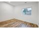 Well-lit bedroom with hardwood floors and a window at 3035 Fallswood Dr, Gastonia, NC 28052