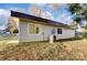 Modern house exterior with light beige siding and metal roofing at 3035 Fallswood Dr, Gastonia, NC 28052