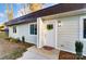Modern home's exterior features a light-beige facade and stylish entryway at 3035 Fallswood Dr, Gastonia, NC 28052