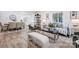 Modern living room with hardwood floors, a neutral color palette, and ample natural light at 3035 Fallswood Dr, Gastonia, NC 28052