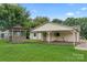 House with gazebo and carport in a grassy backyard at 3249 Farm Lake Sw Dr, Concord, NC 28027