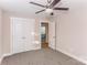 Spacious bedroom with double doors leading to another room at 358 Camden Nw Ct, Concord, NC 28027