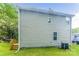 Home's exterior showcasing light-grey siding and a wooden deck at 358 Camden Nw Ct, Concord, NC 28027