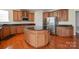 Kitchen with island, granite countertops, and stainless steel appliances at 4201 Amber Leigh Way Dr, Charlotte, NC 28269