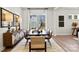 Elegant dining room featuring hardwood floors and natural light at 6721 Baker Creek Ave, Indian Land, SC 29707