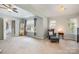 Spacious main bedroom with ample natural light and sitting area at 7422 Henderson Park Rd, Huntersville, NC 28078