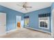 Bright bedroom with ceiling fan and carpet flooring at 815 Players Ridge Rd, Hickory, NC 28601