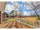 Deck overlooking a golf course with trees and blue sky at 815 Players Ridge Rd, Hickory, NC 28601