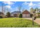 Brick house with two-car garage and mailbox at 815 Players Ridge Rd, Hickory, NC 28601