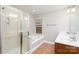 Main bathroom with double vanity, soaking tub, and shower at 11005 Magna Ln, Indian Trail, NC 28079