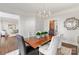 Spacious dining room with hardwood floors and large windows at 13101 Whisper Creek Dr, Charlotte, NC 28277