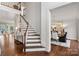 Elegant entryway with hardwood floors and a grand staircase at 13101 Whisper Creek Dr, Charlotte, NC 28277