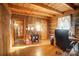 Home office with wood walls and built-in shelving at 13195 Nc 801 Hwy Hwy, Mt Ulla, NC 28125