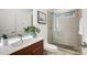Stylish bathroom, featuring a walk-in shower and wood vanity at 1410 Deborah Cir, Shelby, NC 28150
