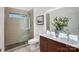 Modern bathroom with a walk-in shower and double vanity at 1410 Deborah Cir, Shelby, NC 28150