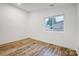Well-lit bedroom featuring hardwood floors and a window at 1410 Deborah Cir, Shelby, NC 28150