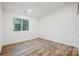 Simple bedroom with wood flooring and a window at 1410 Deborah Cir, Shelby, NC 28150