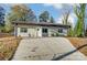 Charming craftsman style home with a concrete driveway at 1410 Deborah Cir, Shelby, NC 28150