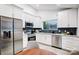 Modern kitchen featuring stainless steel appliances and white cabinets at 1410 Deborah Cir, Shelby, NC 28150