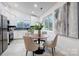 Modern kitchen with stainless steel appliances and white cabinetry at 1410 Deborah Cir, Shelby, NC 28150