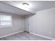 Bright and airy room with laminate flooring and neutral-colored walls at 208 Oakland Dr, Lowell, NC 28098