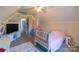 Cozy bedroom with a twin bed and playful decor at 2800 Churn Ct, Monroe, NC 28110