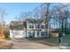 Two-story house with attached garage and a mailbox at 2800 Churn Ct, Monroe, NC 28110