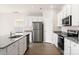 Modern kitchen with stainless steel appliances and island at 3250 Maple Ridge Dr, Gastonia, NC 28052