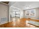 Open living room and kitchen with hardwood floors at 3603 Goodson Rd, Maiden, NC 28650