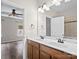 Bathroom with double vanity, large mirror, and modern fixtures at 4641 Craigmoss Ln, Charlotte, NC 28278