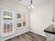 Breakfast nook with access to the backyard patio via sliding glass doors at 4641 Craigmoss Ln, Charlotte, NC 28278