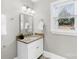 Clean bathroom with granite vanity and updated fixtures at 542 W Kingston Ave, Charlotte, NC 28203