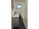 Small bathroom with a tub, toilet and sink at 703 Buffalo St, Shelby, NC 28150