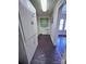 Laundry room with built-in cabinetry and a window at 703 Buffalo St, Shelby, NC 28150
