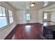 Bright living room featuring hardwood floors and ample natural light at 703 Buffalo St, Shelby, NC 28150