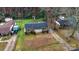 Brick ranch house with yard, seen from above at 733 Milan E Rd, Charlotte, NC 28216