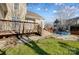 Backyard with deck, trampoline, and grassy area at 7750 Trailridge Dr, Tega Cay, SC 29708