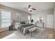 Spacious bedroom with neutral decor and large windows at 7750 Trailridge Dr, Tega Cay, SC 29708