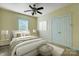 Bedroom with neutral walls, carpet, and ceiling fan at 7750 Trailridge Dr, Tega Cay, SC 29708