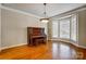 Elegant dining room with bay window and hardwood floors at 7750 Trailridge Dr, Tega Cay, SC 29708